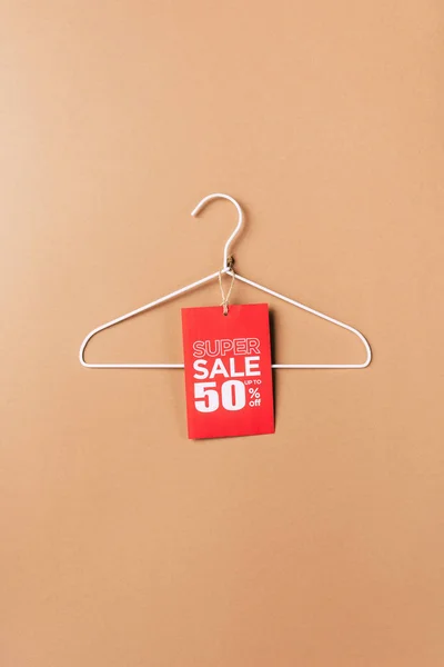 Hanger Red Super Sale Tag Fifty Percents Discount Beige — Stock Photo, Image