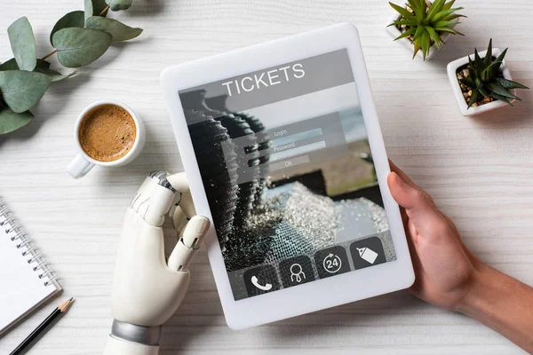 Partial View Man Prosthesis Arm Using Digital Tablet Tickets Screen — Stock Photo, Image