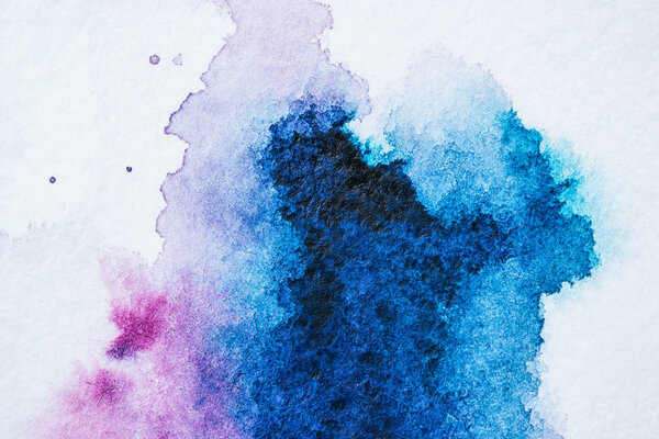 abstract texture with bright blue and purple watercolor blots