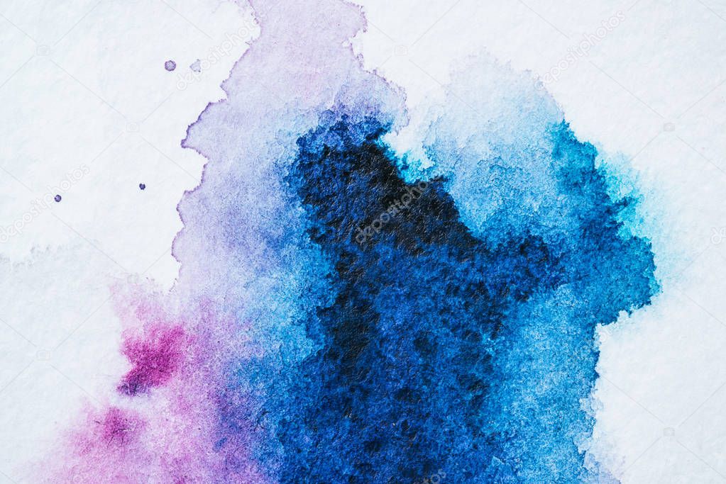 abstract texture with bright blue and purple watercolor blots