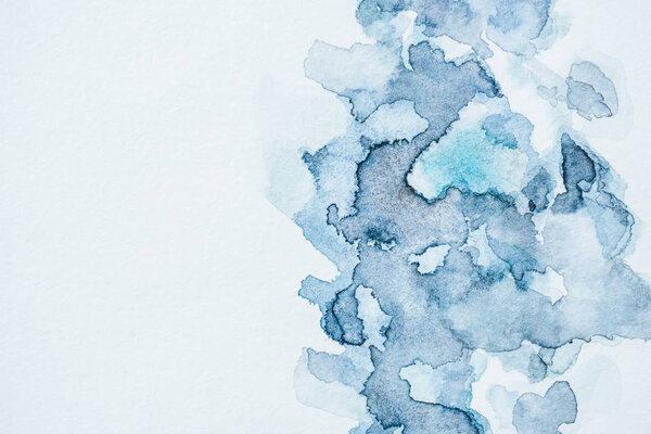 abstract background with blue watercolor blots 