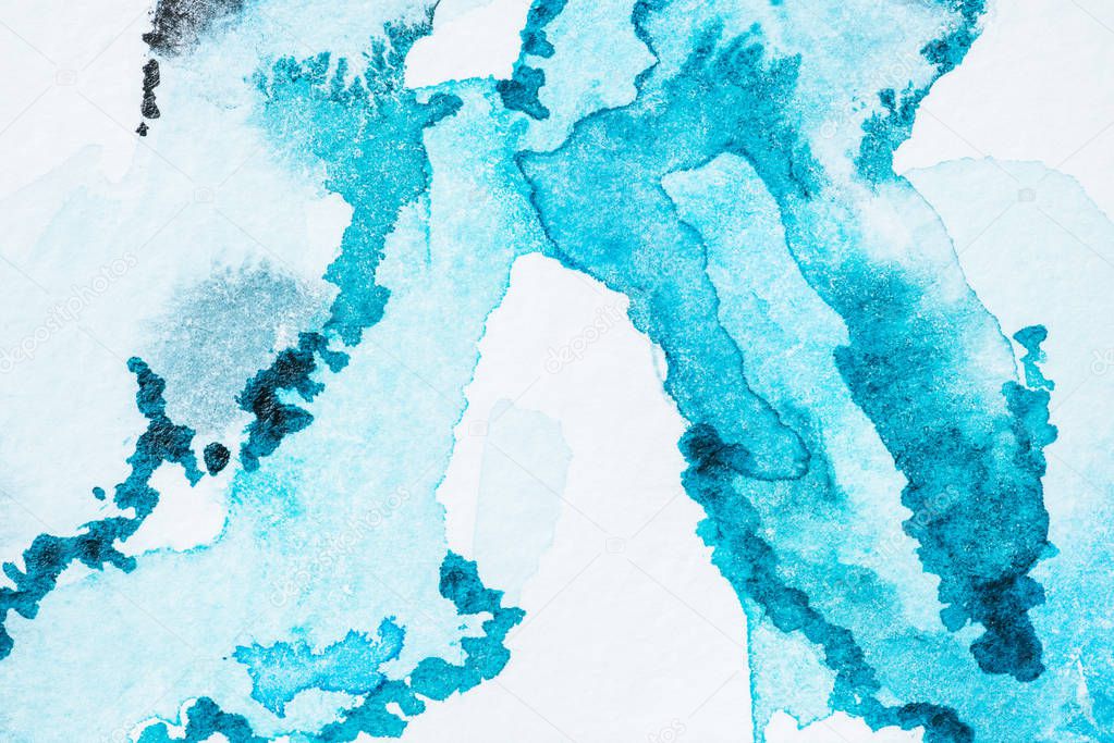 abstract bright turquoise watercolor blots on paper texture