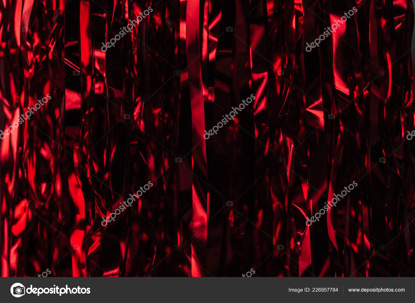 Dark Red Streamers Christmas Background Stock Photo by