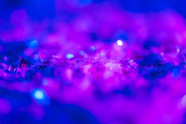 parlak arka plan ile ultra violet glitter ve bokeh