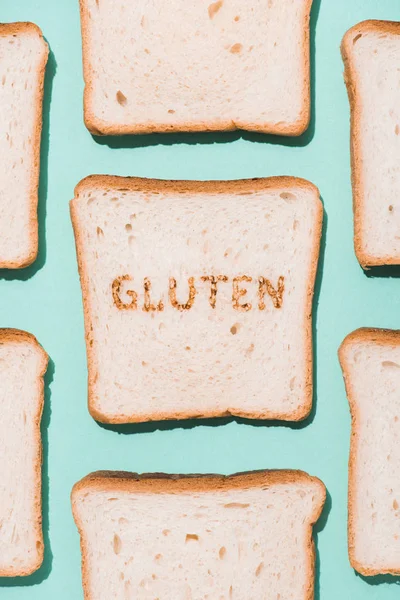 Top View Bread Slices Burned Gluten Sign Blue Surface — Stock Photo, Image