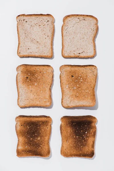 Bovenaanzicht Van Rijen Van Toast Verschillende Stadia Van Gebraden Witte — Stockfoto