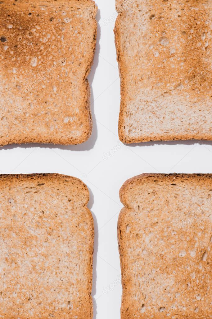 top view of assembled toasts on white surface