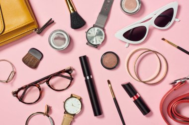 Top view of watches, lipstick, earrings, glasses, sunglasses, bag, eyeshadow, blush, belt, cosmetic brushes, bracelets and mascara clipart