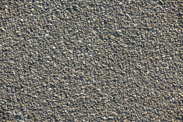 Full frame image of wall with gray gravel background — Stock Photo