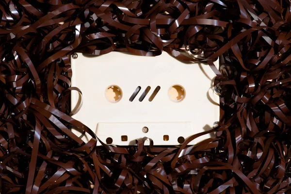 Top view of arranged retro audio cassette with tape — Stock Photo