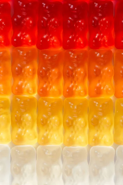 Full frame shot of gummy bears in gradient — Stock Photo