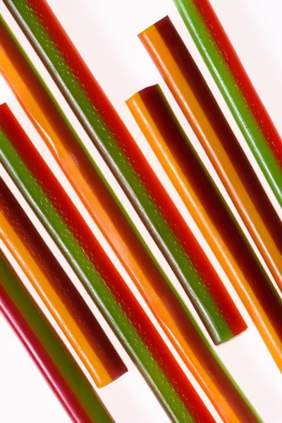 Top view of colorful gummy stripes isolated on white — Stock Photo