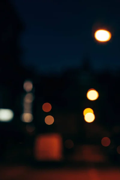 Colorful bokeh lights of night city as background — Stock Photo