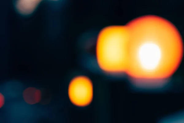 Close up view of colorful bokeh lights on dark background — Stock Photo