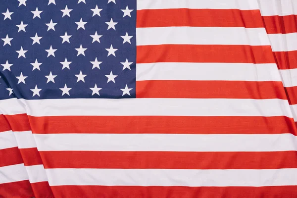 Vista superior del fondo plegado de la bandera americana - foto de stock