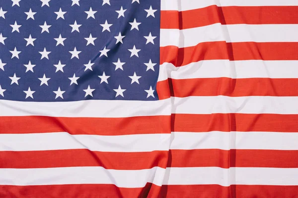 Vista dall'alto di piegato bandiera americana sfondo — Foto stock