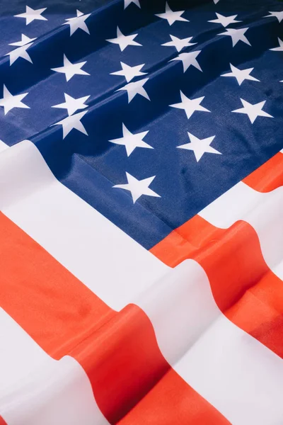 Vue rapprochée du fond plié du drapeau américain — Photo de stock