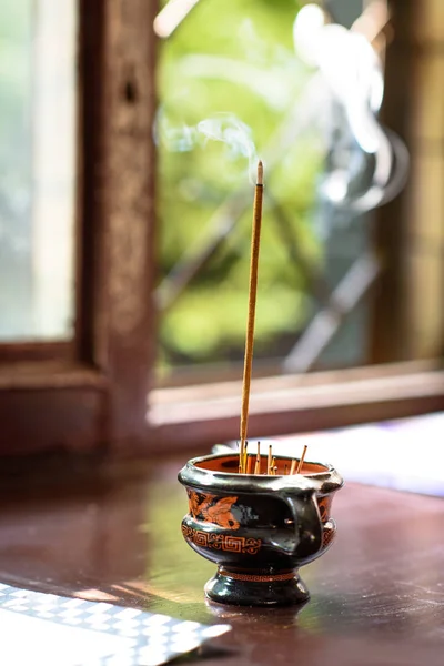 Close up view of candle for aromatherapy on wooden windowsill — Stock Photo