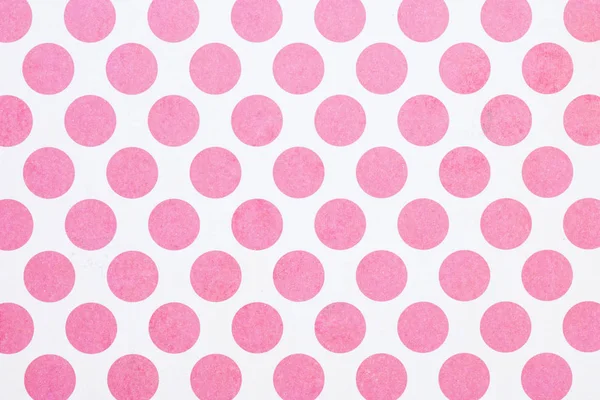 Full frame image of white wall with pink dots background — Stock Photo