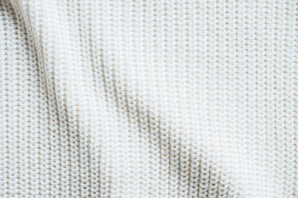 Full frame image of white woolen fabric background — Stock Photo