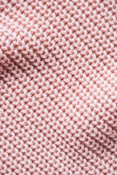 Imagen de marco completo de tejido de lana rosa fondo - foto de stock