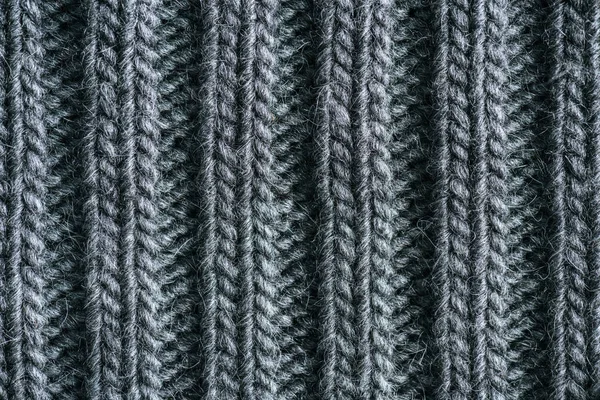 Full frame image of grey knitted woolen fabric background — Stock Photo