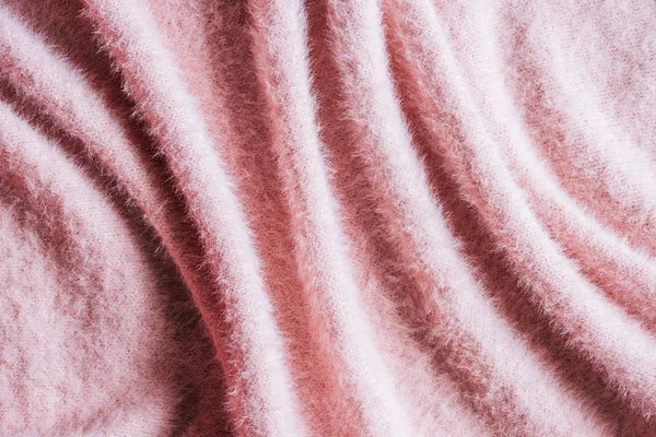 Full frame image of pink fluffy woolen fabric background — Stock Photo