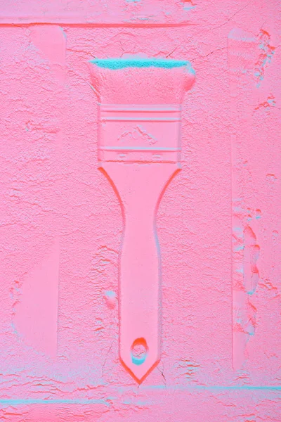 Top view of paint brush shape in pink powder texture — Stock Photo
