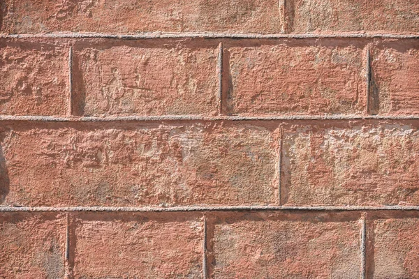 Vista de cerca de fondo de pared de ladrillo envejecido marrón - foto de stock