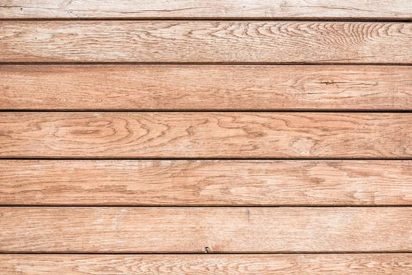 Top view of light brown wooden background with horizontal planks — Stock Photo