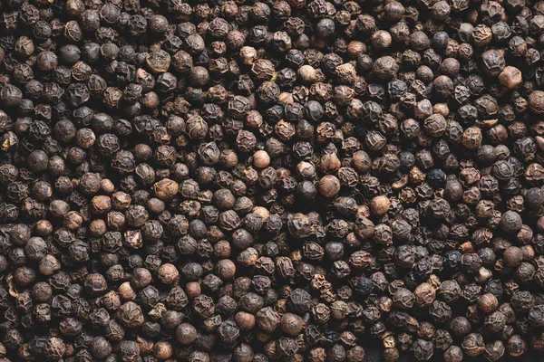 Full frame view of dried aromatic peppercorns background — Stock Photo