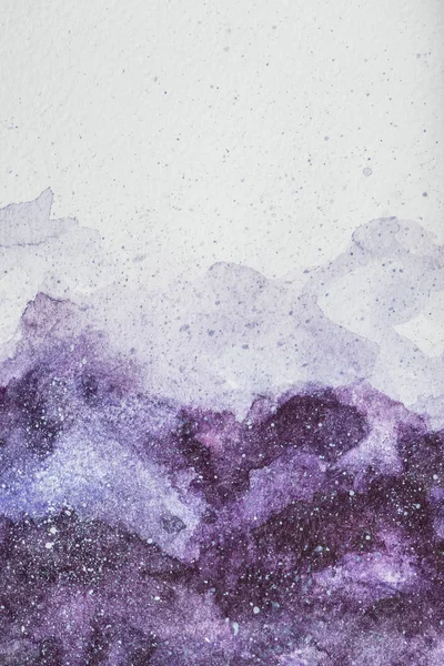 Space painting with purple watercolor paint on white background — Stock Photo