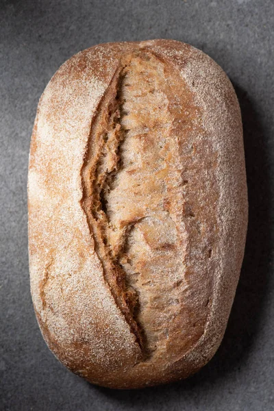 Top view of ciabatta bread on grey surface — Stock Photo