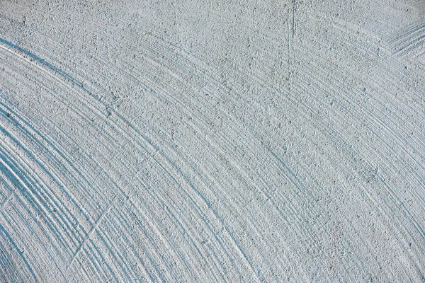 Close up of white concrete wall with lines and curves — Stock Photo