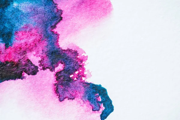 Taches d'aquarelle rose et violet sur papier blanc texture — Photo de stock