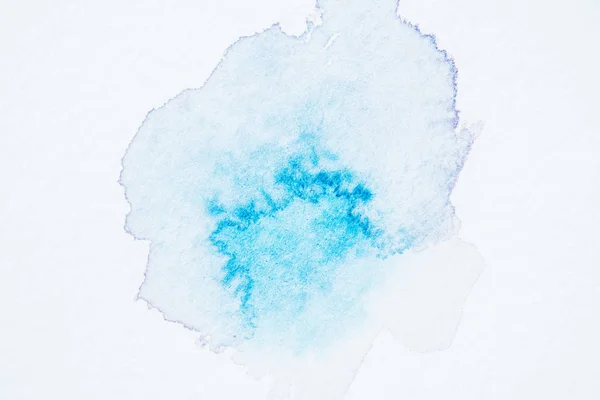 Tache aquarelle turquoise lumineuse abstraite sur papier blanc — Photo de stock