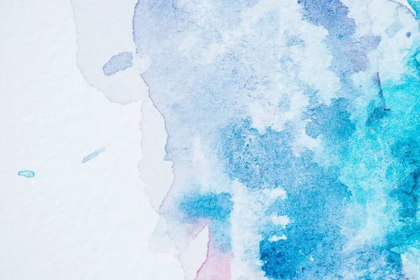 Abstract bright blue watercolor blots on paper textured — Stock Photo