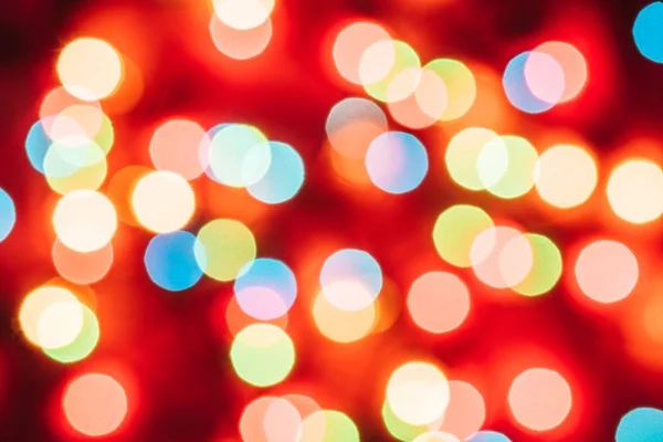 Fond de Noël avec Bokeh coloré et lumières vives — Photo de stock