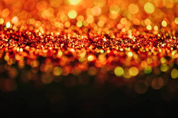 Neujahrshintergrund mit rotem Glitzer und Bokeh — Stock Photo