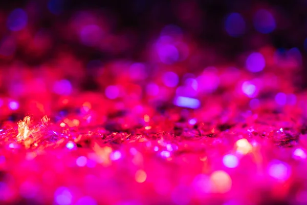 Sparking texture with bright pink glitter and bokeh — Stock Photo