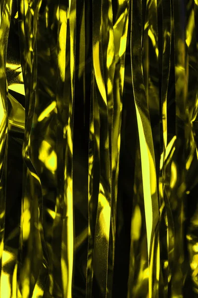 Golden shiny serpentine as christmas background — Stock Photo