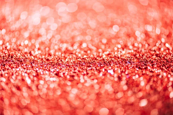 Nouveau fond de l'année avec des paillettes rouges déconcentrées — Photo de stock