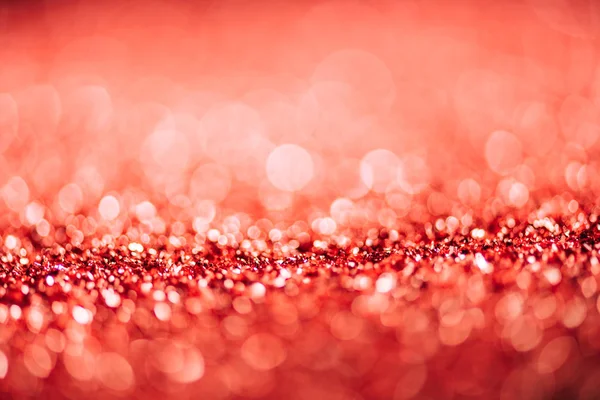 Abstract christmas background with red glitter and bokeh — Stock Photo