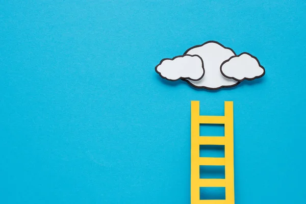 Paper ladder with clouds and copy space on background, setting goals concept — Stock Photo