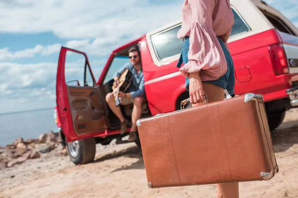 Selective Focus Girl Suitcase Boyfriend Guitar Red Jeep Road Trip — Stock Photo, Image