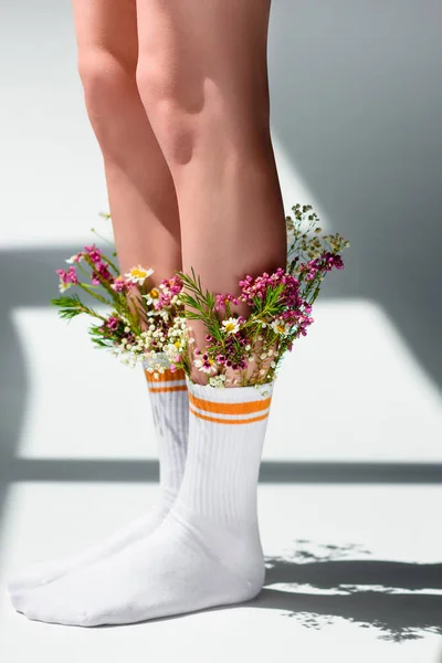 Close Partial View Young Woman Beautiful Flowers Socks Standing Grey — Stock Photo, Image