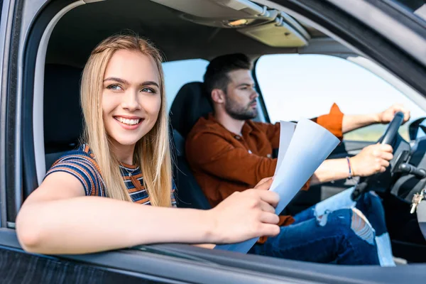 Young Smiling Woman Sitting Map Hands While Her Boyfriend Driving — Stock Photo, Image