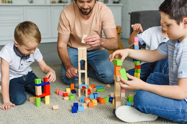 Partial View Father Kids Playing Wooden Blocks Together Floor Home — Stock Photo, Image