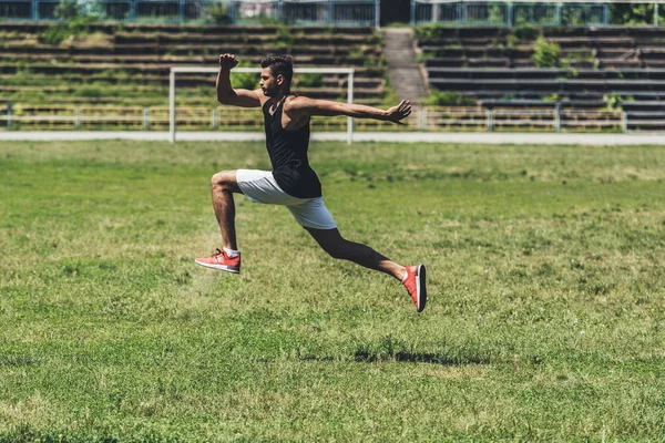 Side View Young Sportsman Jumping Playground Field — Stock Photo, Image