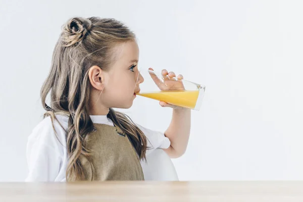 Cute Little Schoolgirl Drinking Orange Juice Isolated White — Stock Photo, Image